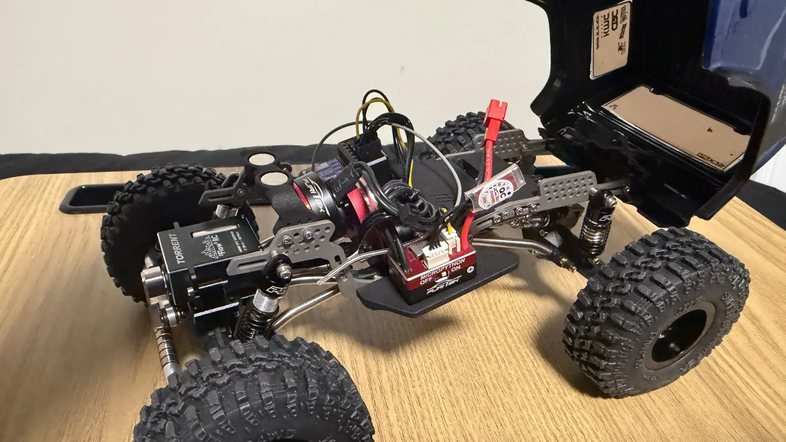 SCX24 chassis with the battery and ESC exposed