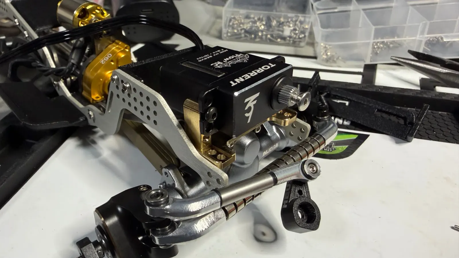 Close up of a Furitek servo mounted on an SCX24 chassis